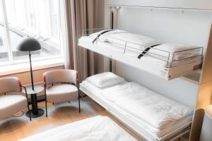 Scandic Oslo City tesisinde bir ranza yatağı veya ranza yatakları
