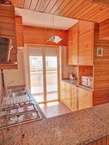 Küche/Küchenzeile in der Unterkunft wanderlust sicily appartamento Sun