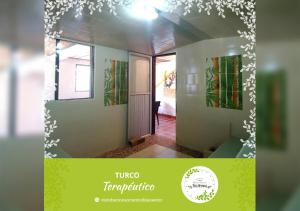 una imagen de una habitación con un pasillo con una puerta en Vista Hermosa Eco Hostal, en Carmen de Viboral