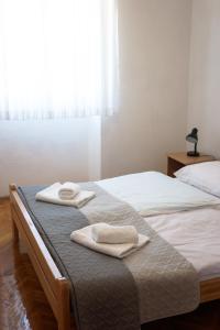 Postel nebo postele na pokoji v ubytování Apartment Basioli + 17 fotografií