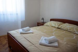 Postel nebo postele na pokoji v ubytování Apartment Basioli