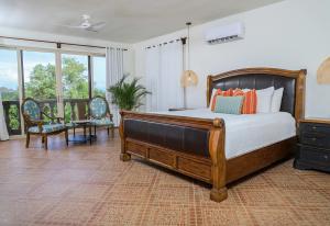 Postel nebo postele na pokoji v ubytování El Regalo Resort + 37 fotografií