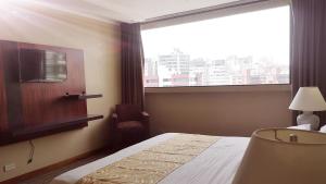Letto o letti in una camera di Edificio Akros