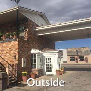 a brick house with the words outside at Nights Inn - Richfield in Richfield +9 photos