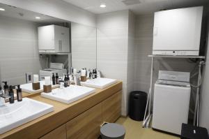 Kuchyň nebo kuchyňský kout v ubytování Tabist Hotel Smart Sleeps Oita Station