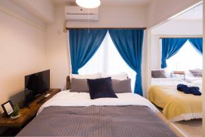 Tsukimura Building客房内的一张或多张床位