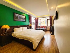 Postel nebo postele na pokoji v ubytování Nguyễn Hùng Hotel Sapa