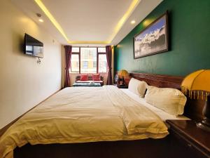 Postel nebo postele na pokoji v ubytování Nguyễn Hùng Hotel Sapa