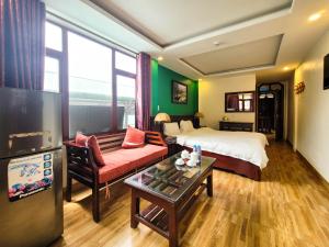 Posezení v ubytování Nguyễn Hùng Hotel Sapa