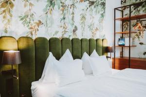 Postel nebo postele na pokoji v ubytování Hotel Brücklwirt + 37 fotografií