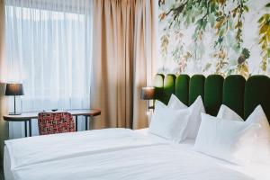 Posteľ alebo postele v izbe v ubytovaní Hotel Brücklwirt