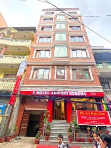 a building in front of a hotel attempt center at Hotel Airport Gurkha in Kathmandu