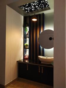 Giường trong phòng chung tại Casa Maria Mystica apartments, Mananthavady, Wayanad