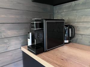 Kuchyň nebo kuchyňský kout v ubytování Reborn Cabins