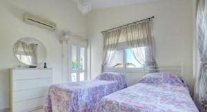 Postel nebo postele na pokoji v ubytování Thaliana House 2 Bedroom near Ayia Napa + 12 fotografií