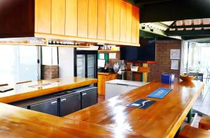 Kuchyň nebo kuchyňský kout v ubytování De Werf Lodge