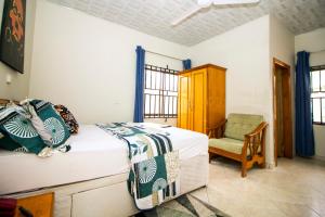 PRESTIGE Guesthouse ,Ksi客房内的一张或多张床位