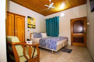 PRESTIGE Guesthouse ,Ksi客房内的一张或多张床位