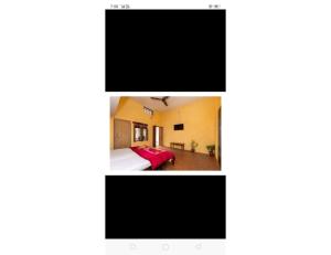 a screenshot of a room with a bed and a tv at Mridul Homestay Orchha, Madhya Pradesh in Orchha