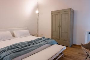 Postel nebo postele na pokoji v ubytování Palazzo Console