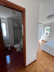 Koupelna v ubytování Cavallo, bilocale vista montagne