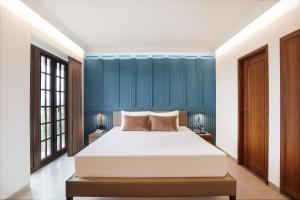 Lemon Tree Hotel, Rajkot客房内的一张或多张床位