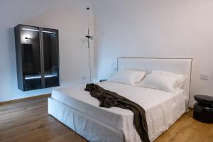 Postel nebo postele na pokoji v ubytování Palazzo Console