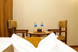 Letto o letti in una camera di Hotel Airport Gurkha