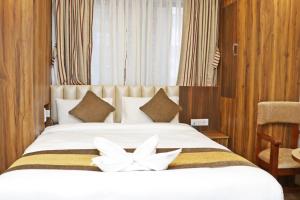 Letto o letti in una camera di Hotel Airport Gurkha