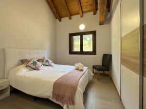 Postel nebo postele na pokoji v ubytování Apartamentos Rurales AINARIAK