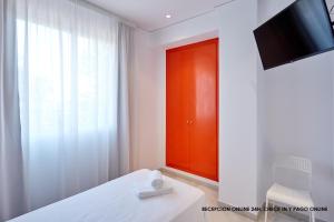 TV a/nebo společenská místnost v ubytování Hotel DL Port + 35 fotografií
