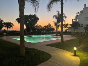 The swimming pool at or close to 2 bed apartment on Condado De Alhama with roof solarium N5