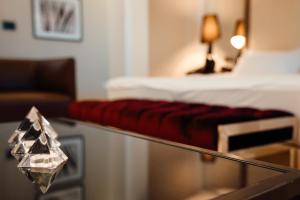 Postel nebo postele na pokoji v ubytování Senator Hotel