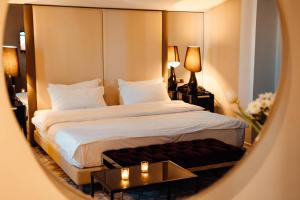 Ένα ή περισσότερα κρεβάτια σε δωμάτιο στο Senator Hotel