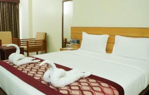 Letto o letti in una camera di Urban Suites