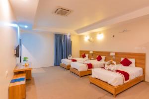 Letto o letti in una camera di Siddhartha Resort, Chisapani