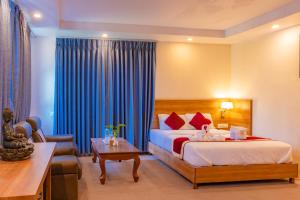 Letto o letti in una camera di Siddhartha Resort, Chisapani