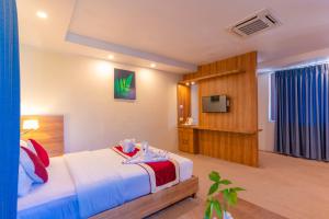 Letto o letti in una camera di Siddhartha Resort, Chisapani