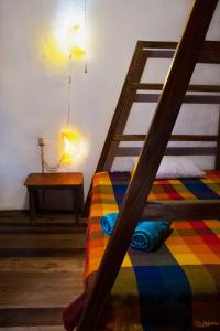 Voodi või voodid majutusasutuse Hostal Olmito Canoa toas