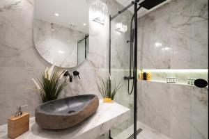 Kylpyhuone majoituspaikassa #Toucan by halu! apartments