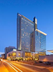 a tall building with a street in front of it at Hyatt Regency Denver at Colorado Convention Center in Denver