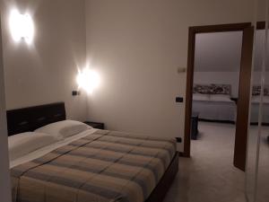 Postel nebo postele na pokoji v ubytování Hotel Kristall