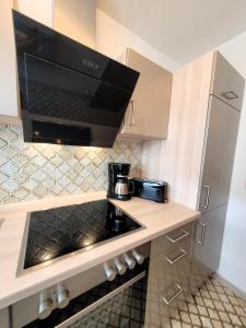 Kuchyň nebo kuchyňský kout v ubytování Winterberg Appartement 21110