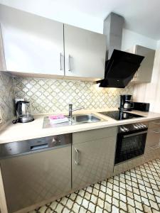 Kuchyň nebo kuchyňský kout v ubytování Winterberg Appartement 21110