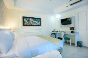 TV tai viihdekeskus majoituspaikassa The Cube Hotel Malioboro, Azana Hotels Collection