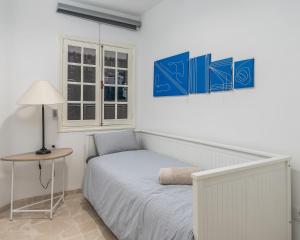 A bed or beds in a room at Los Gigantes apartamento de 3 habitaciones