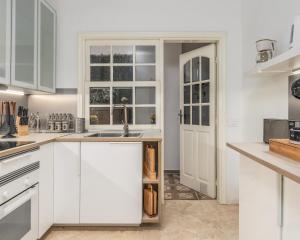 A kitchen or kitchenette at Los Gigantes apartamento de 3 habitaciones