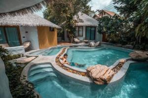 Bazén v ubytování Kundala Beach Resort Hua Hin nebo v jeho okolí