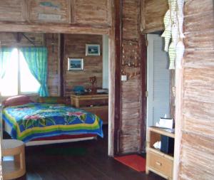 Llit o llits en una habitació de Ceningan Cool Breeze Villa
