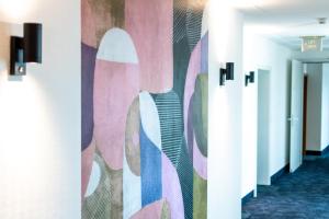TV a/nebo společenská místnost v ubytování Taste Hotel Kulmbach